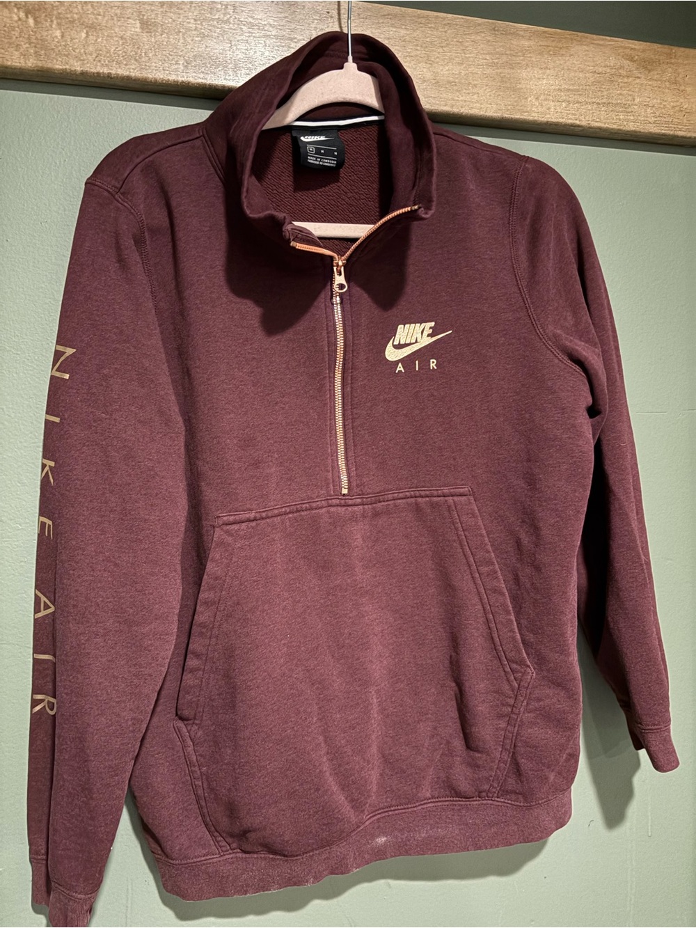 Nike Air Woman’s Half-Zip Pullover Sweater in Burgundy with Gold Accents